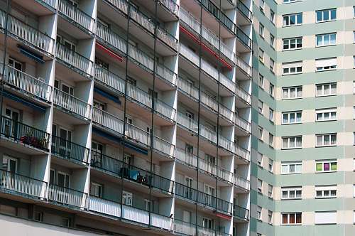 building white and green high-rise building high rise