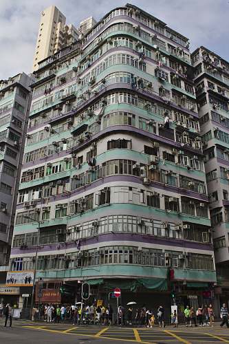 building white and purple building high rise