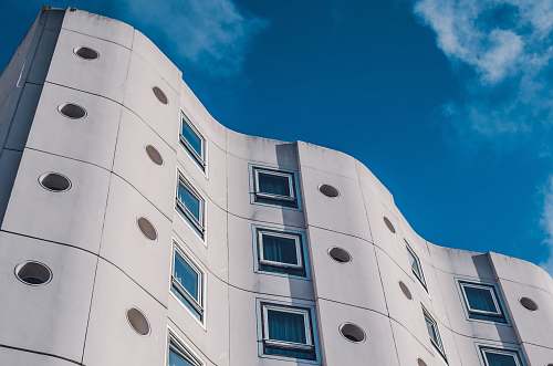 town white building with glass windows urban