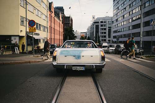 car white Ford car on road helsinki