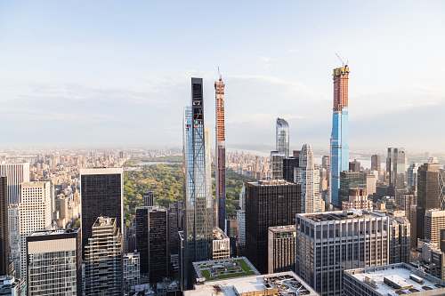 building wide-angle photography of high-rise buildings during daytime high rise