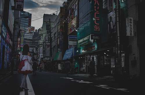 urban woman standing on road metropolis