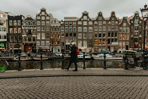 person woman walking beside canal human