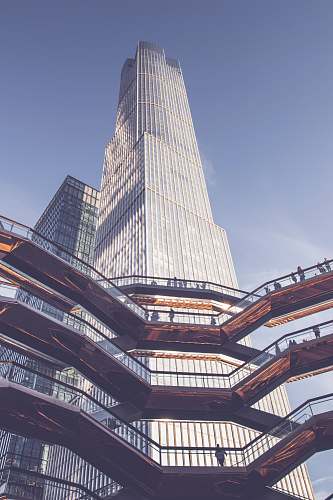 urban worm view photo of gray building during daytime town