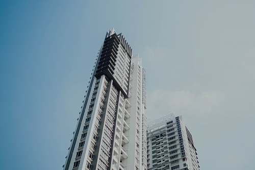 building worm view photo of white building high rise