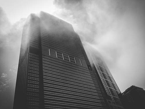 black-and-white worm's-eye view photography of building architecture