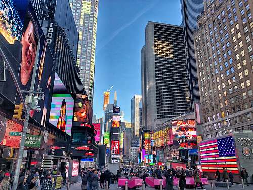 pedestrian New York buildings during daytime person