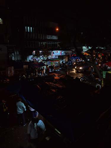 person people standing beside stores urban