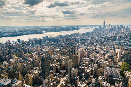 nature aerial view of buildings near body of water outdoors
