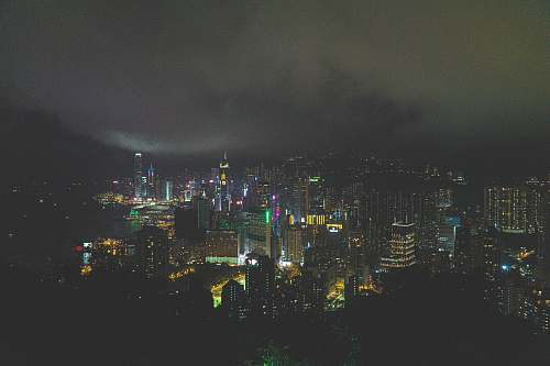 nature lighted buildings during nighttime outdoors