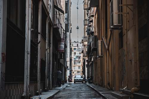 town architectural photography of alleyway building