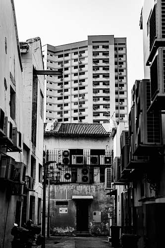black-and-white greyscale photography of building road