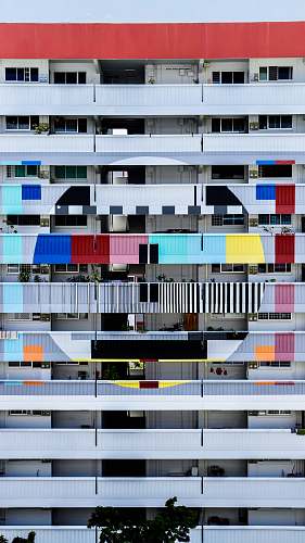 building multicolored multiple story building urban