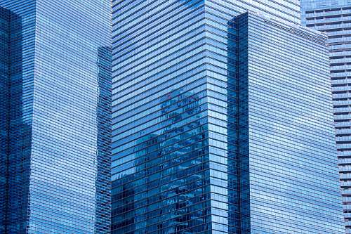 building curtain wall building during daytime city