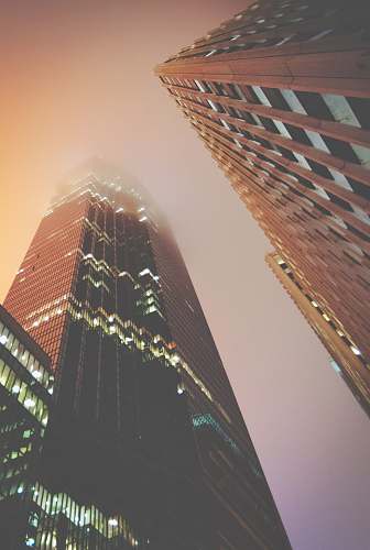 town low angle photo of high rise buildings building