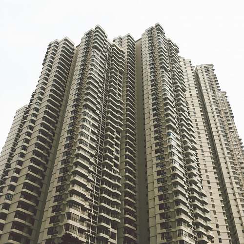 city low-angle photography of building building