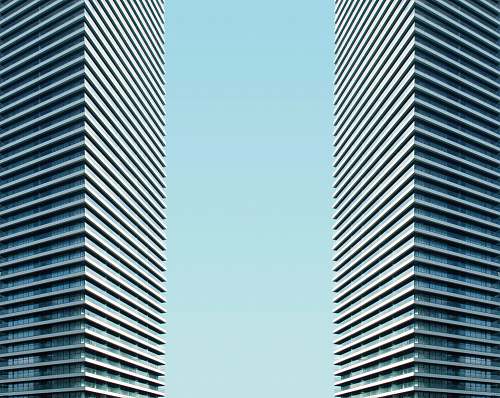 building two tall building during daytime city