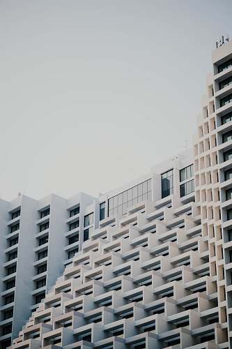 building white concrete building high rise