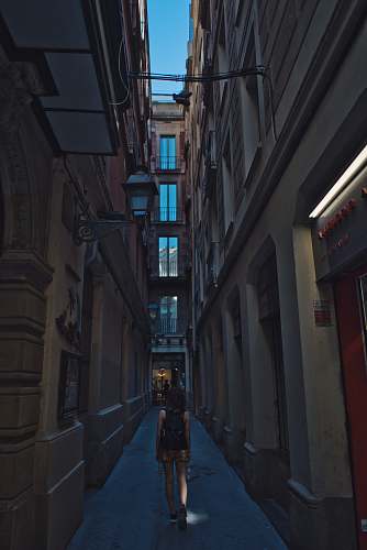 human woman walking on pathway on focus photography person