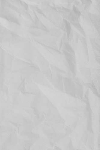 grey white textile on brown wooden table paper