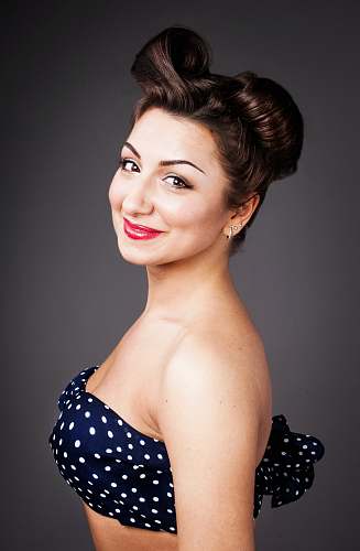 person woman wearing black and white bandeau face