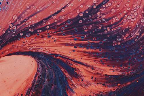 mountain red and black abstract painting outdoors