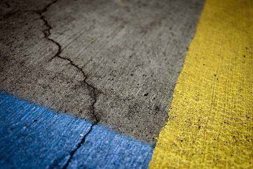 sidewalk grey and yellow concrete pavement path