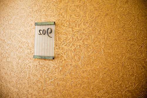 text 902 signage on wall number