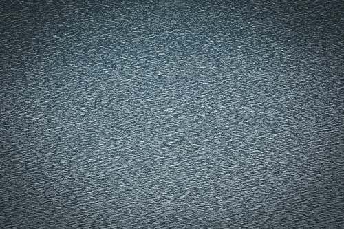 grey blue textile in close up image rug