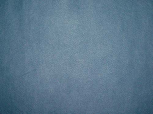 grey blue textile with black background rug