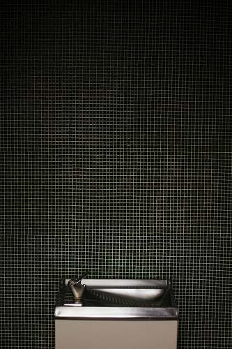 grey gray stainless steel drinking fountain is empty fountain