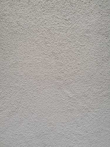 grey white wall paint with black textile concrete