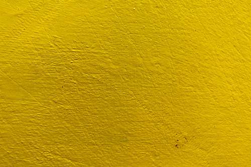 wall yellow painted wall with yellow paint brown
