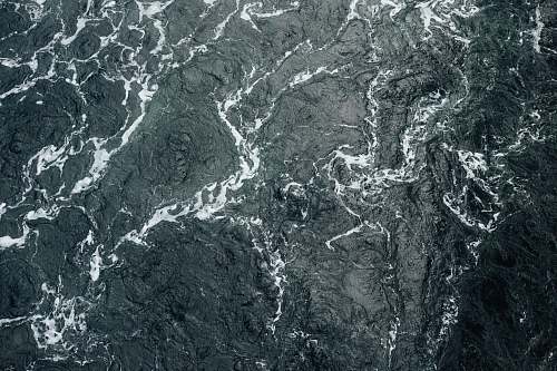 texture A drone shot of the choppy surface of the sea grey