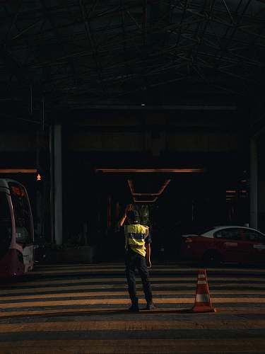 tarmac man standing on road road