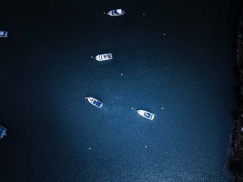 astronomy topview of yacht on body of water galaxy