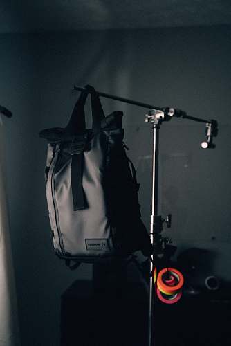backpack black backpack on rack grey