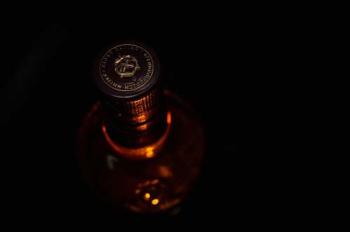 beverage closed clear glass bottle alcohol