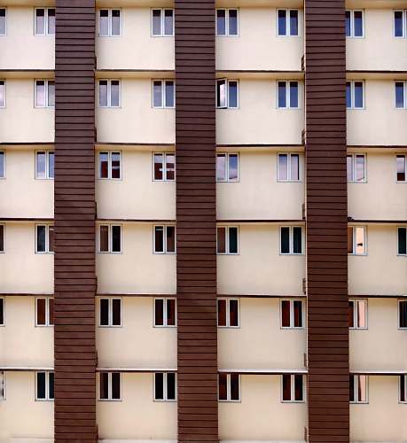 city architectural photo of brown and beige building high rise