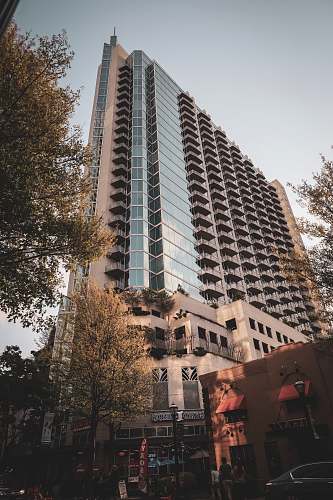 city blue and beige high-rise building high rise