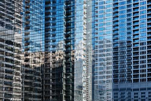condo blue glass high-rise buildings view housing