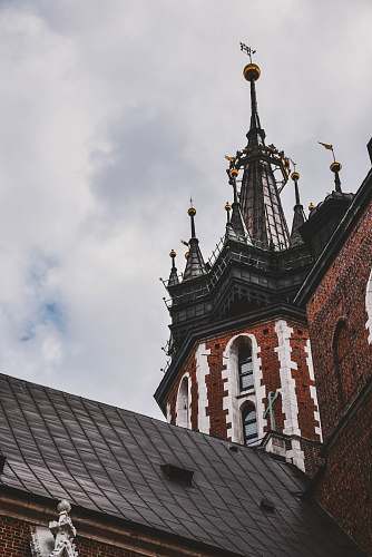 architecture brown and gray brick building tower