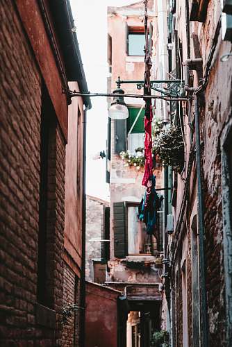 city brown brick wall road