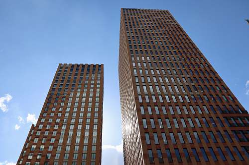 city brown concrete buildings office building
