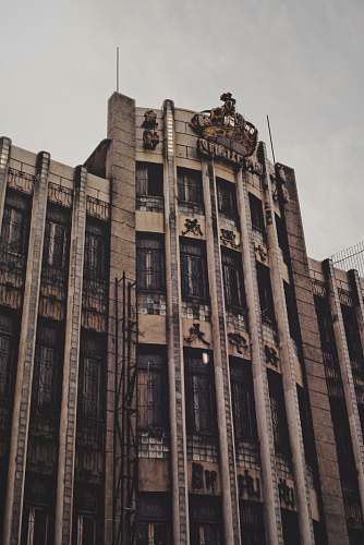 city brown high-rise concrete building high rise