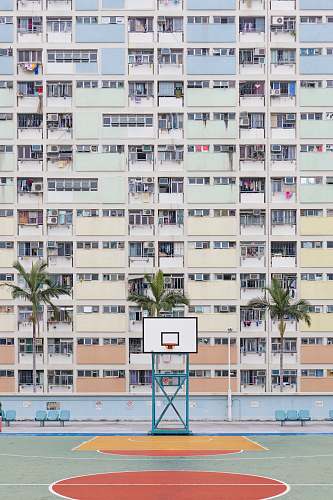city empty basketball court high rise