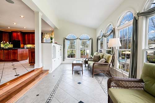 flooring empty living room with white interior paint floor