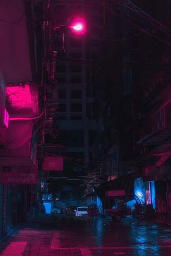 city empty street road surrounded by buildings metropolis