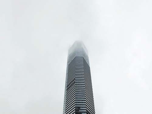 city gray tower building photo high rise