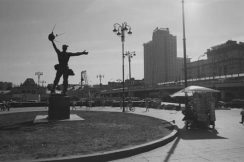 city grayscale photo of statue black-and-white